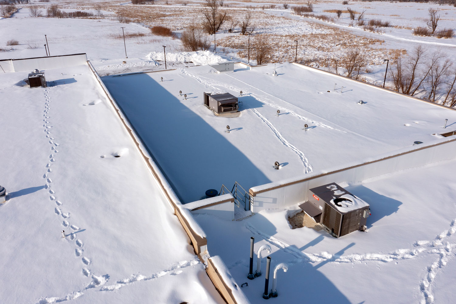 Six Essential Tips for Winter Commercial Roof Maintenance